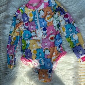 SHEIN Pink and Blue One Piece Swimsuit Care Bears Print